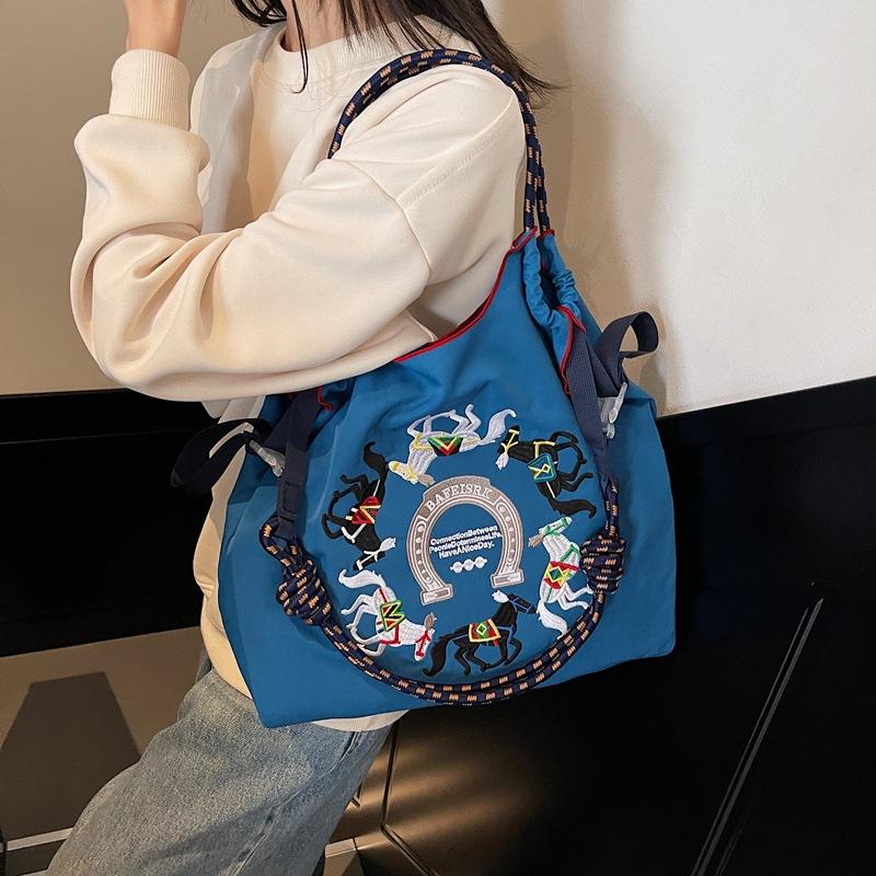 Literary small fresh embroidery pony contrasting color large capacity women's armpit bag new women's shoulder messenger bag
