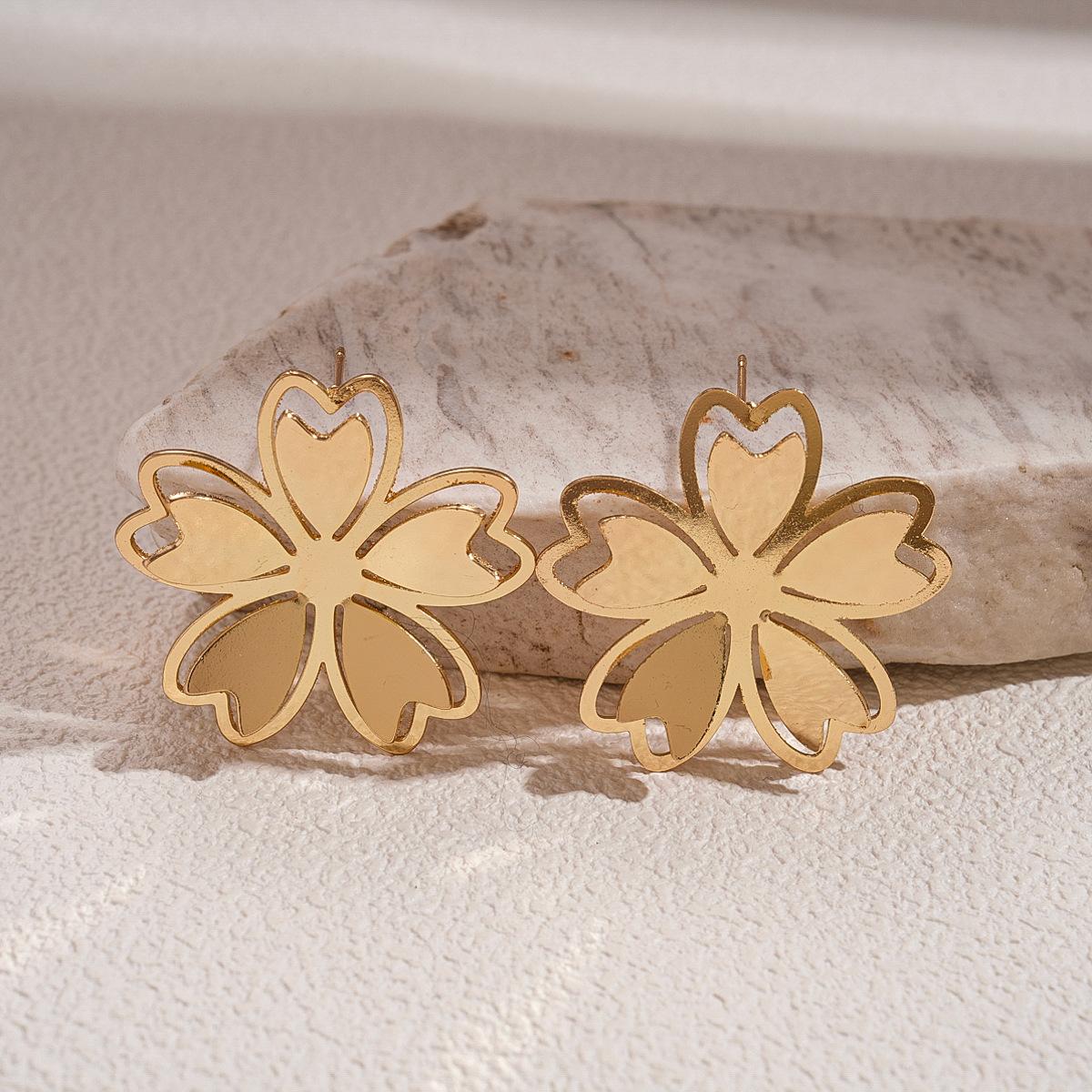 Metal hollow love flower silver needle earrings versatile commuting temperament earrings