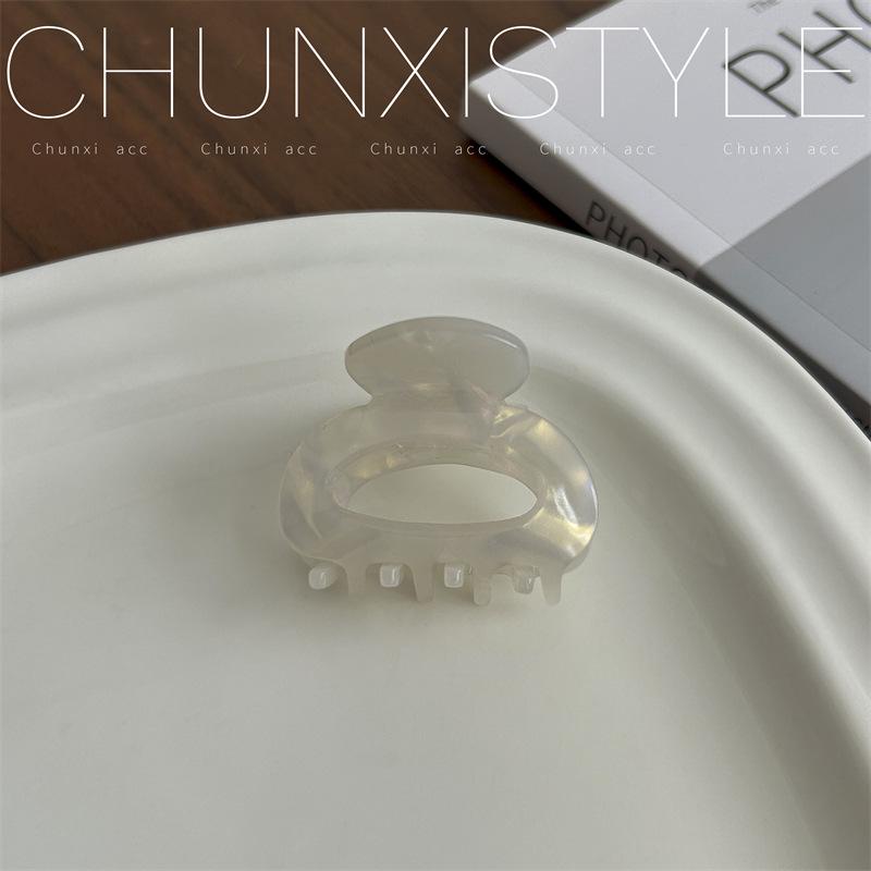 Elegante koreanische Essigsäure Hochsteckfrisur mit kleiner Klauen-Haarspange für Damen