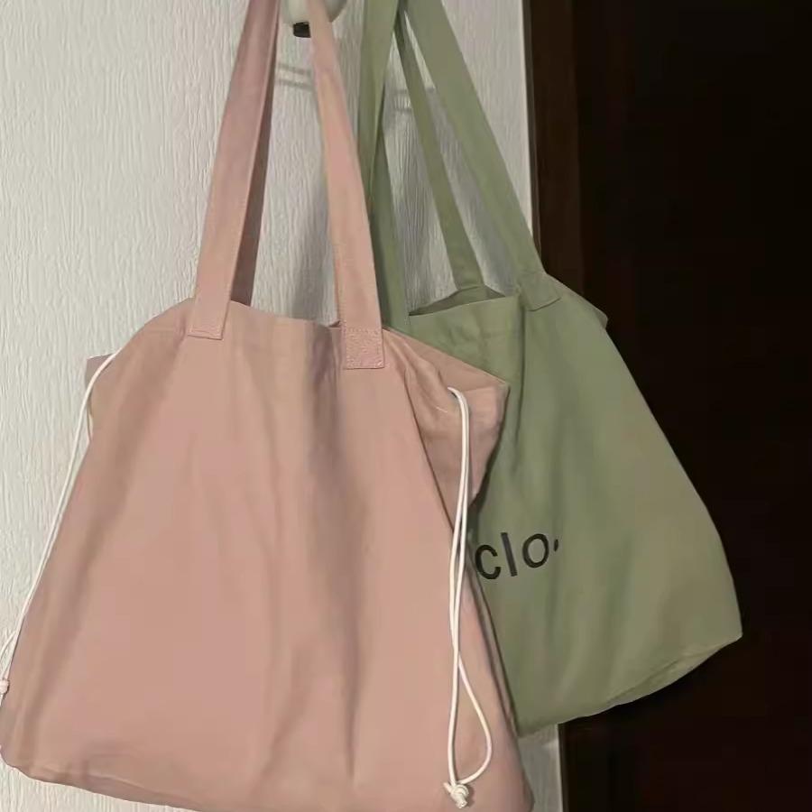 College students commute to class shoulder bag 2024 new large-capacity lazy style versatile tote bag drawstring armpit bag