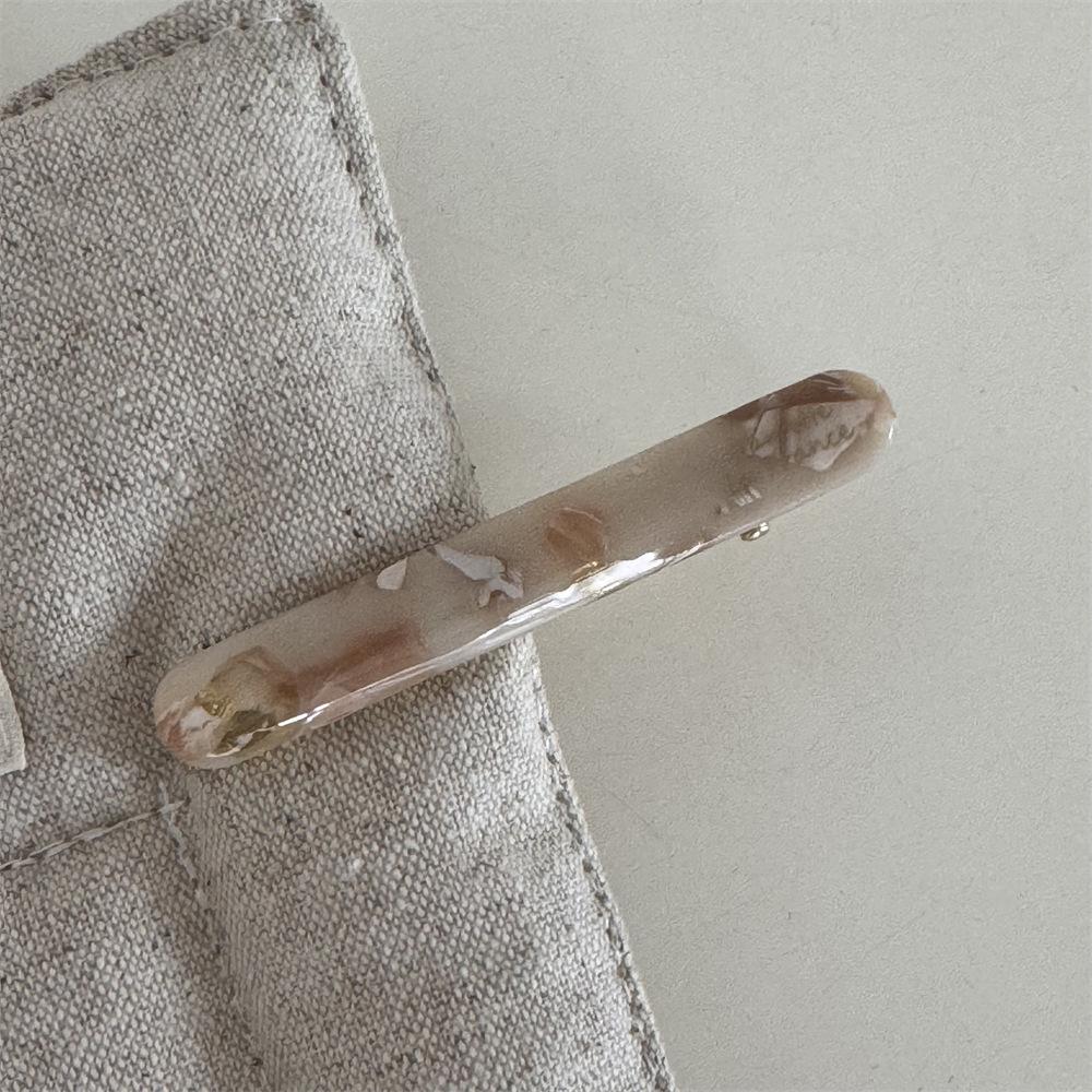 Korean version of the gold label cute little baguette one-word clip French acetic acid texture solid side bangs clip