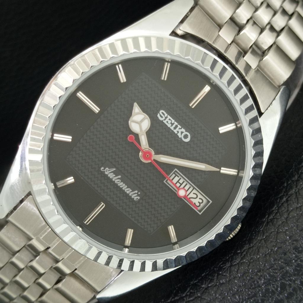 

JAPAN VINTAGE REFURBISHED SEIKO AUTOMATIC 6309A MENS BLACK DIAL WATCH a443143-1