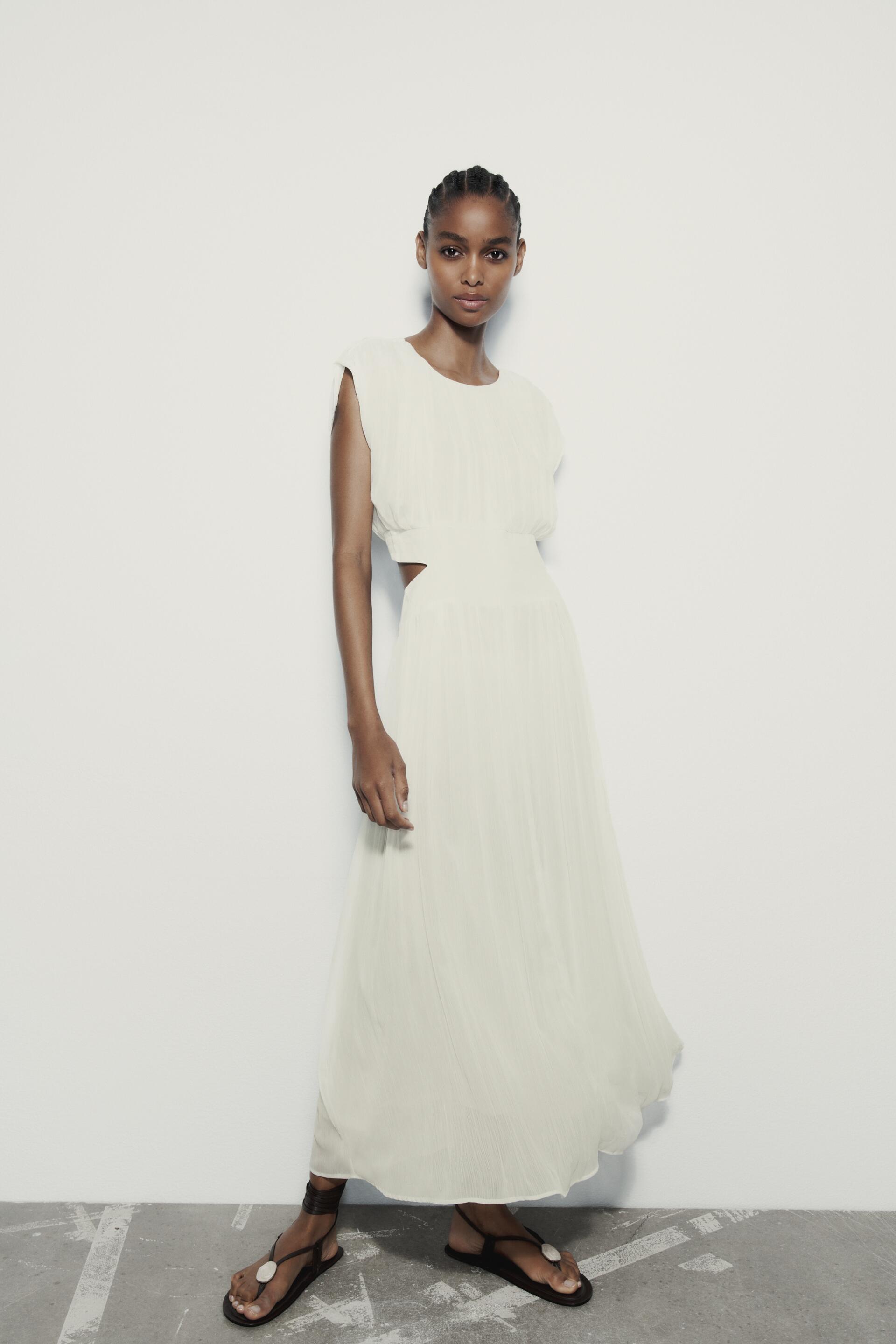 

ПЛИССИРОВАННОЕ МИДИ-ПЛАТЬЕ С ВЫРЕЗАМИ