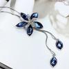 Elegant väderkvarn blomma strass tofsar hängande tröja kedja kvinnor halsband