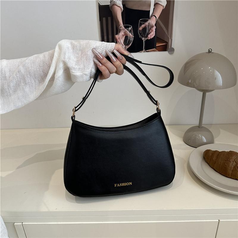 

Simple summer new niche underarm bag female design sense advanced texture temperament solid color shopping shoulder bag чёрный