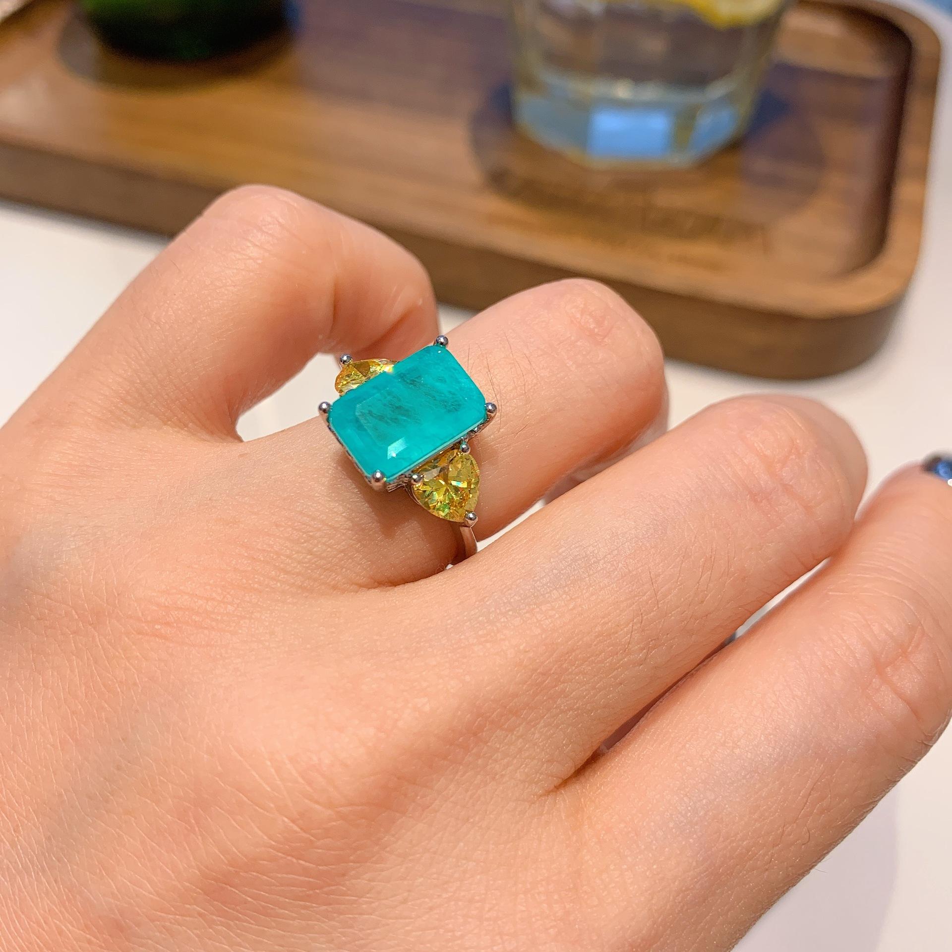 

Кольцо «Знаменитость», микрокольцо с квадратным бриллиантом и крупным зеленым цирконом Ancestor, ювелирное изделие цвета «Параиба». Rectangle 8X12