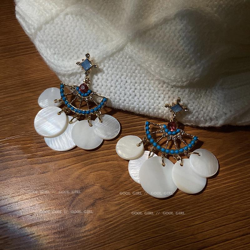 Silver Needle White Heart Tassel Earrings: Luxurious, Versatile, and Stylish Stud Earrings for Women.