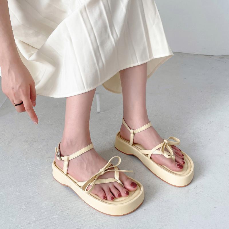 

модные сандалии женские летние 2024 года корейская версия универсальные ретро банты стринги носок бисквитный торт римские сандалии на толстой подошве женские 39 жёлтый