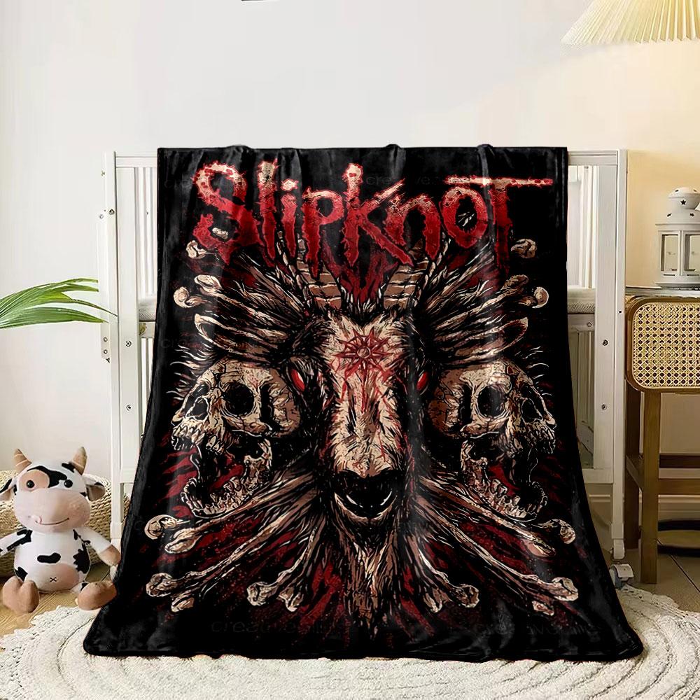 

A goat skull with horns, surrounded by detailed skulls and fiery textures. for all seasons blanket lunch break throw gift 80cm x 120cm