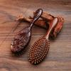 1Pc Sandalwood & Bamboo Air Cushion Brush - Gentle Scalp Massage Comb for All Hair Types with Unique Animal & Floral Designs.