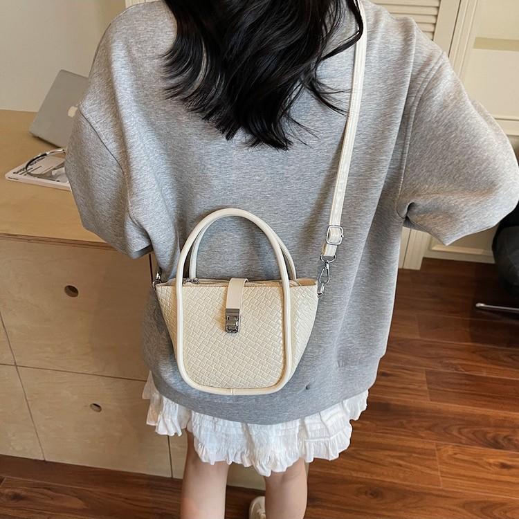 Beliebte Tasche Damen 2025 Sommer neue Mode gewebtes Muster Handtrage-Bucket-Bag schlichte Kinder- und Mütter-Umhängetasche