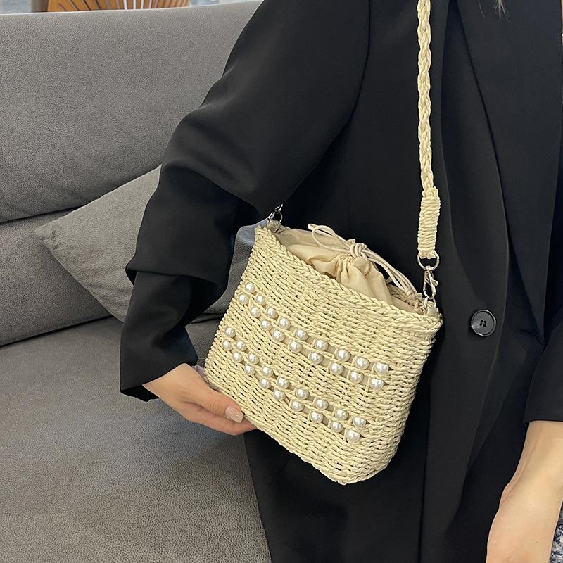 2025 Fashion Niche Pearl Straw Underarm Bags Women New Versatile Temperament Commute Crossbody Bags Vacation Style Beach Bags