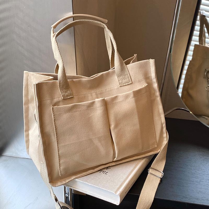 Large Capacity Commuting Tote Bag New Niche Canvas Bag Women's Retro One-shoulder Handbag Simple Crossbody Bag