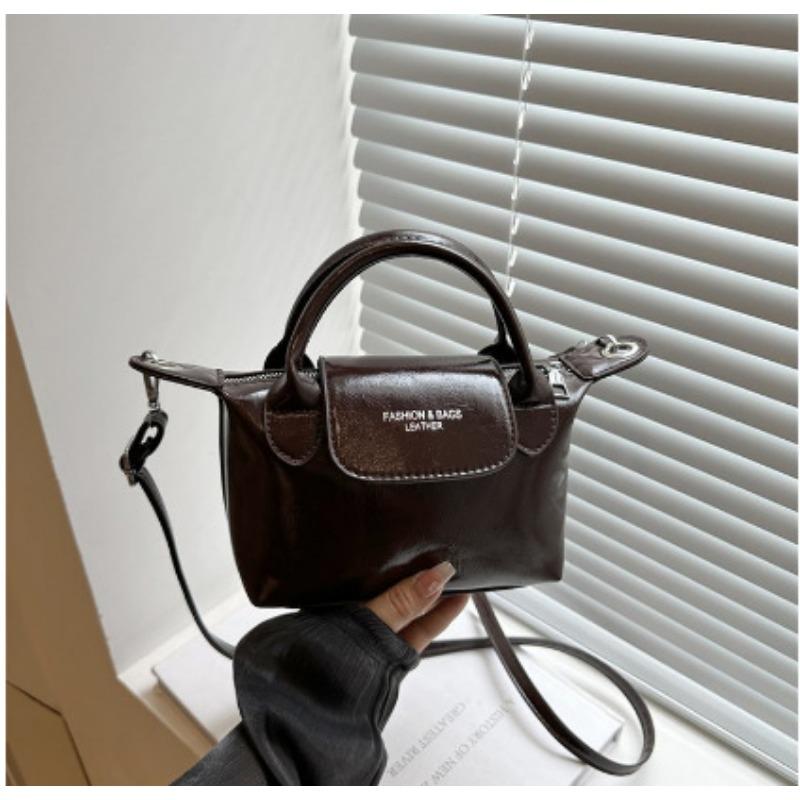 Spring and summer retro portable small square bag popular niche design women's bag versatile single shoulder diagonal span dumpling bag