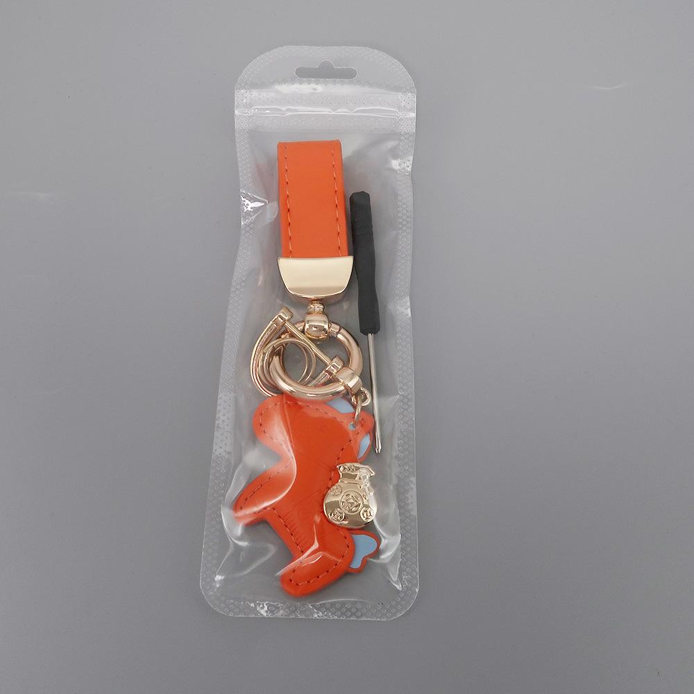Instant Wealth Leather Keychain with Cartoon Pony Pendant for Couples – Trendy Bag and Car Accessory