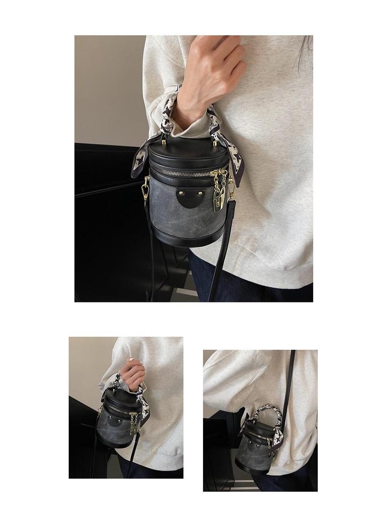 Minimalistická crossbody taška s barevnými bloky: Dámská válcová kabelka na podzim/zimu 2025 - Pokročilá, módní, všestranná