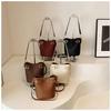 Korean Minimalist Women's High-End Bucket Bag: Versatile, Stylish Niche Design New Crossbody Fashion Accessory