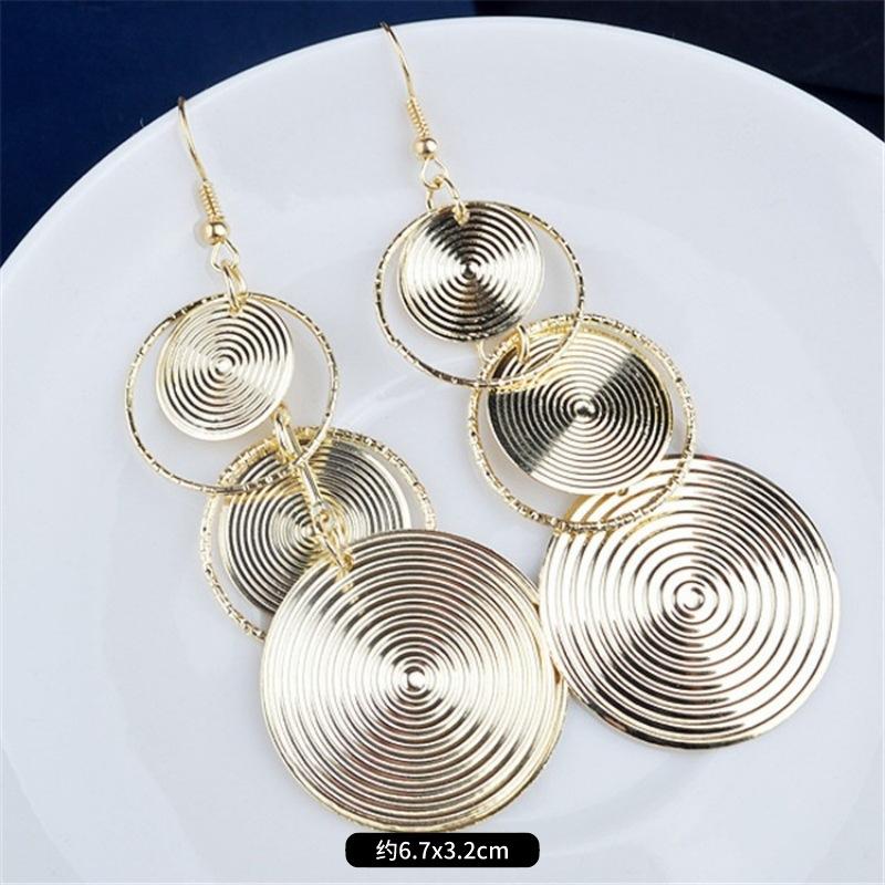 Fashion exaggerated niche temperament fringed earrings retro personality versatile sequined earrings women's long ear jewelry