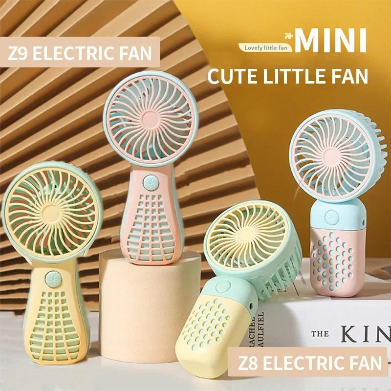 2025 New USB Handheld Charging Fan Cartoon Cute Small Student Charging Small Fan Portable Mini Fan Mini Pocket
