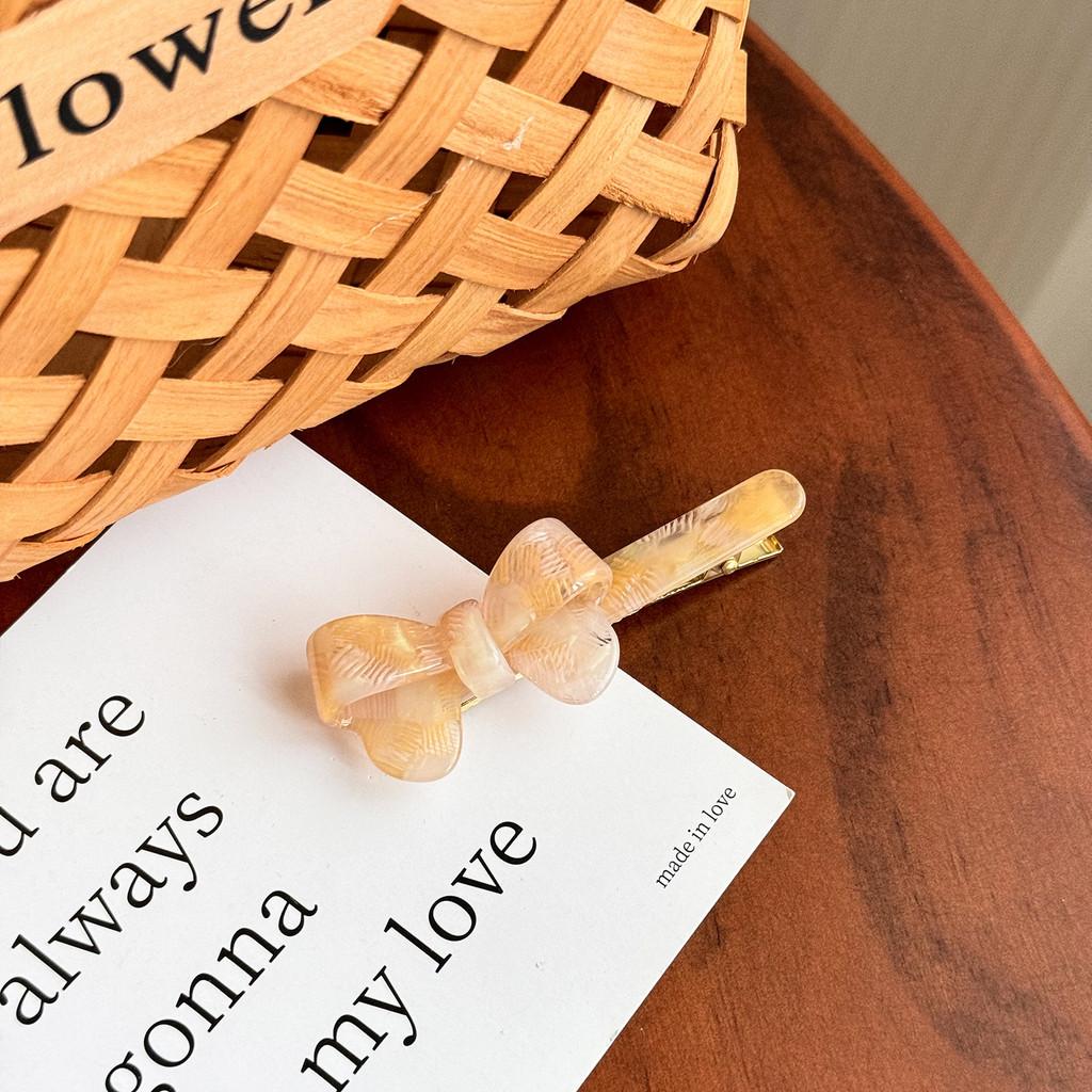 

Элегантная заколка для волос в корейском стиле с бантом из ацетата для модных женщин в различных цветах Light Orange