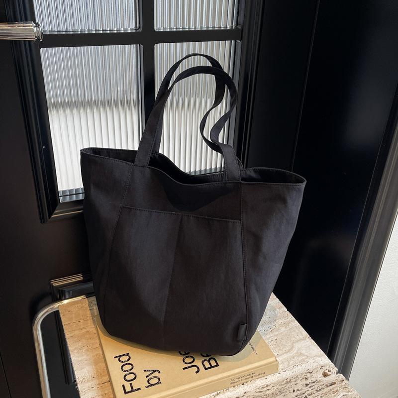 

Canvas big bag women 2025 new college students class bag commuter tote bag casual large capacity shoulder bag чёрный
