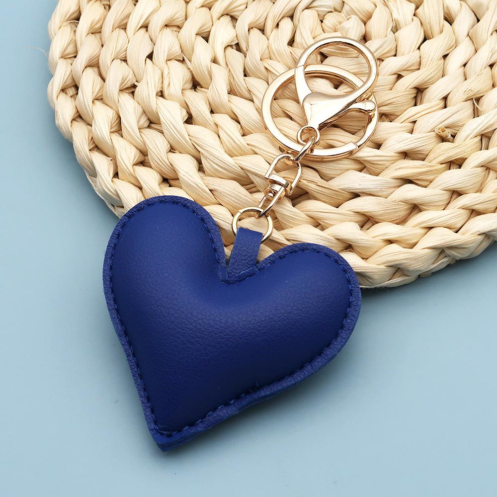 Spot wholesale PU simple peach heart bag pendant Xiaohongshu explosive love couple pendant keychain bag lanyard