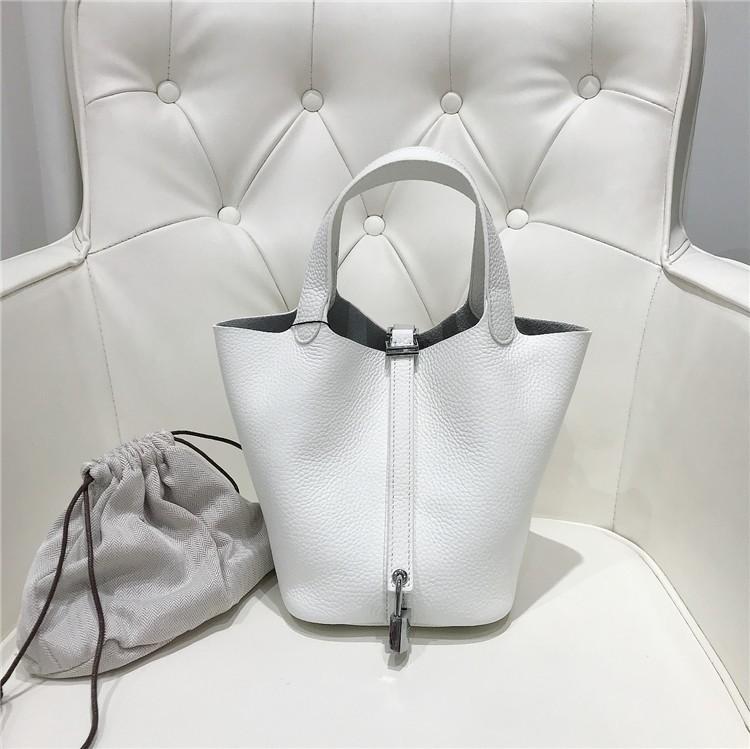 2023 Nowa damska torba ze skóry bydlęcej pierwszej jakości, wzór liczi, koszyk warzywny, worek typu bucket bag, modna i prosta, codzienna torebka