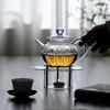 High-Temperature Resistant Borosilicate Glass Pumpkin Tea Kettle with Heating Base for Boiling and Brewing.