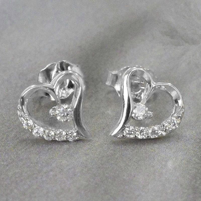 Hot-selling love sweet and cute heart-shaped earrings, slightly inlaid hollow personalized versatile earrings
