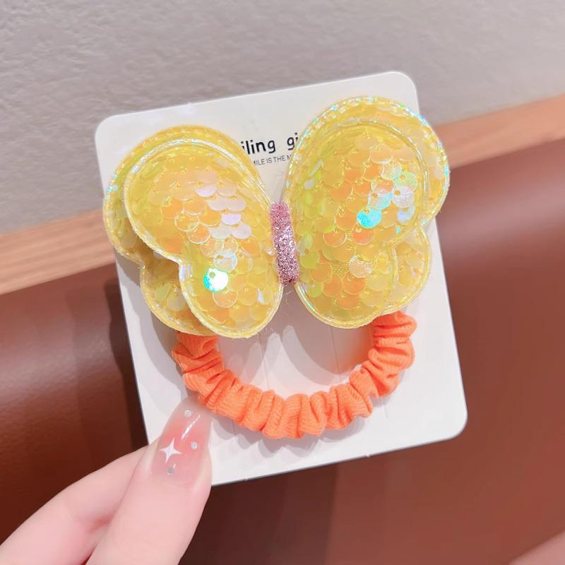 

Детская резинка для волос с пайетками в виде бабочки не повредит волосы. Идеально подходит для высоких хвостов или в качестве головного убора для девочек. Butterfly жёлтый