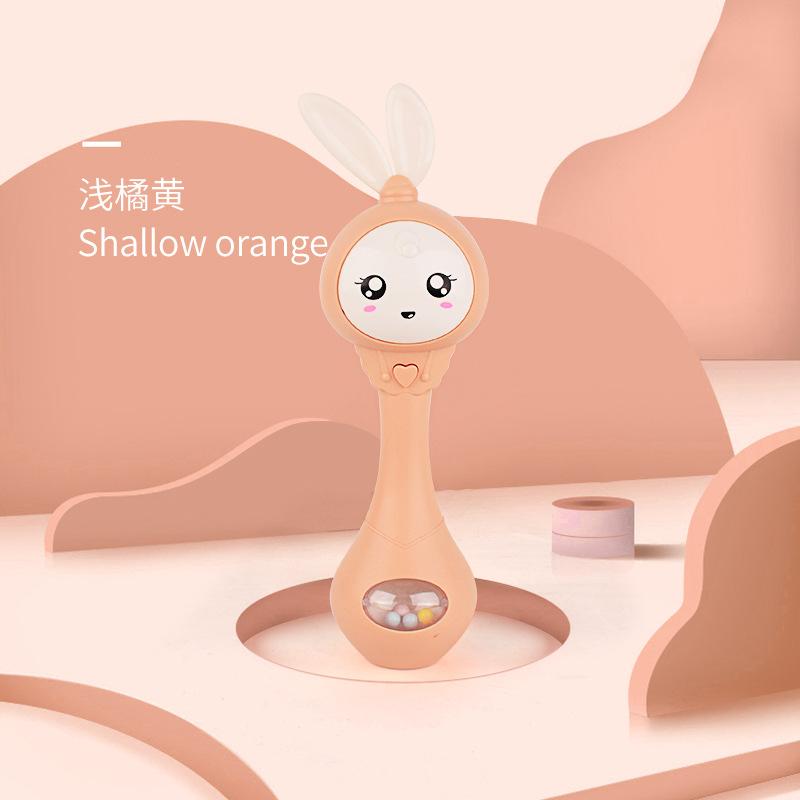 New Sand Hammer Electric Light Music Hand Shake Rhythm Stick Silicone Teether Bite Baby Toys Rattle