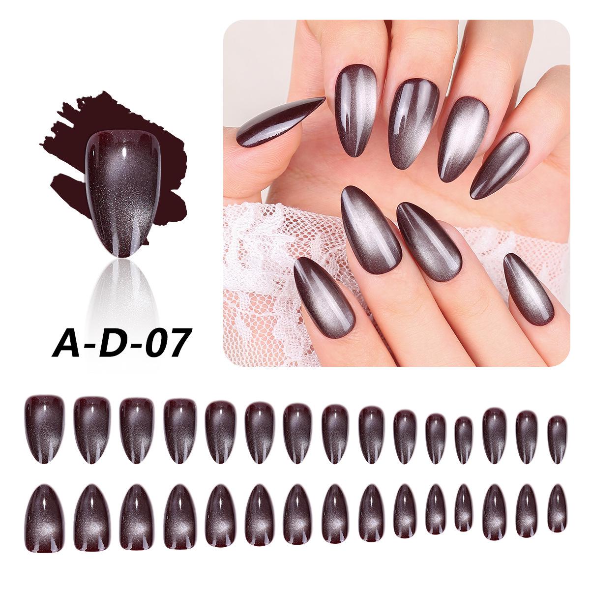 Темно-коричневые средние овальные накладные ногти «кошачий глаз»