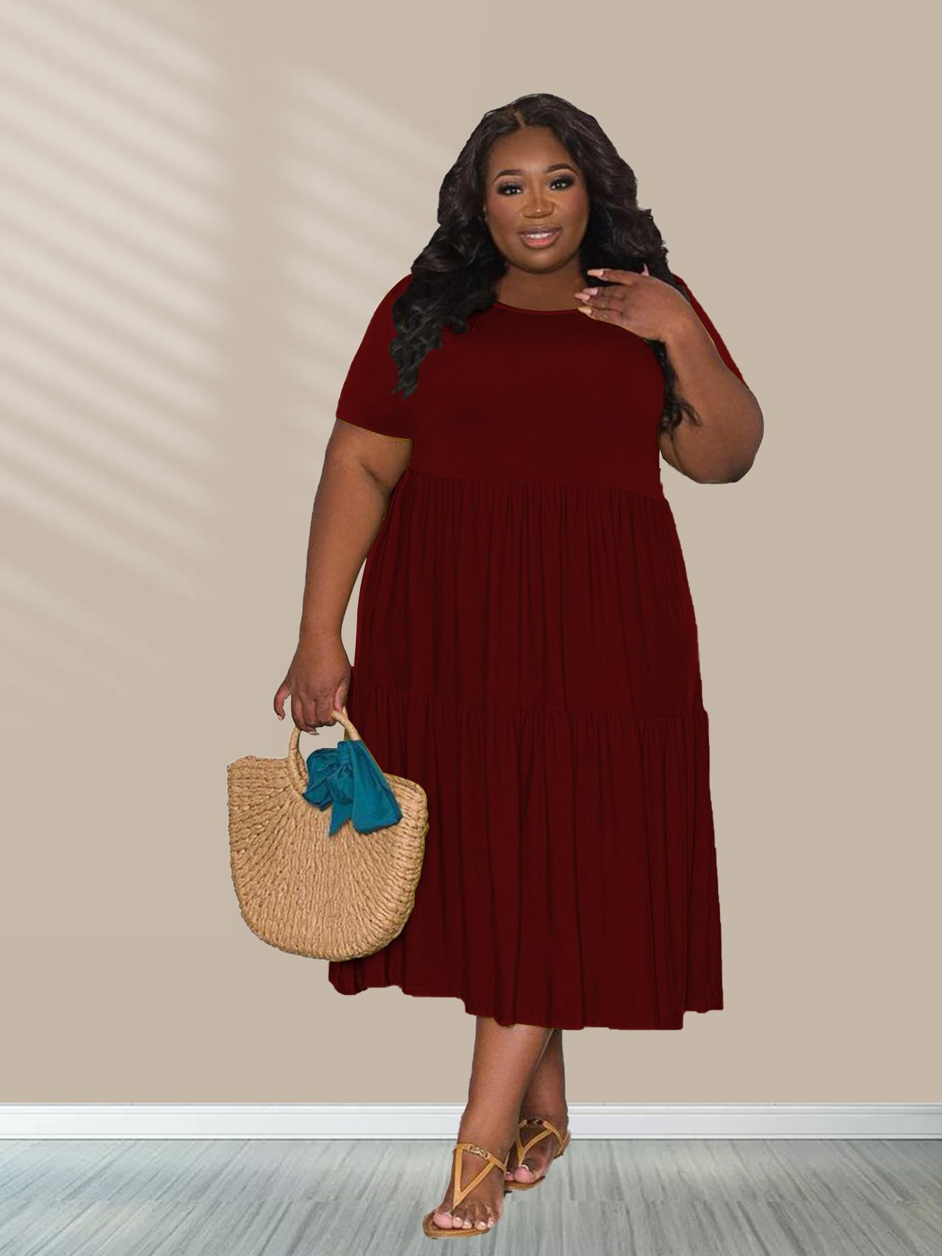 

Жіноча весна-осінь повсякденна сукня з круглим коміром і короткими рукавами великого розміру. Жіноча цільна суцільна плісирована сукня XXXXXL вина червоного кольору