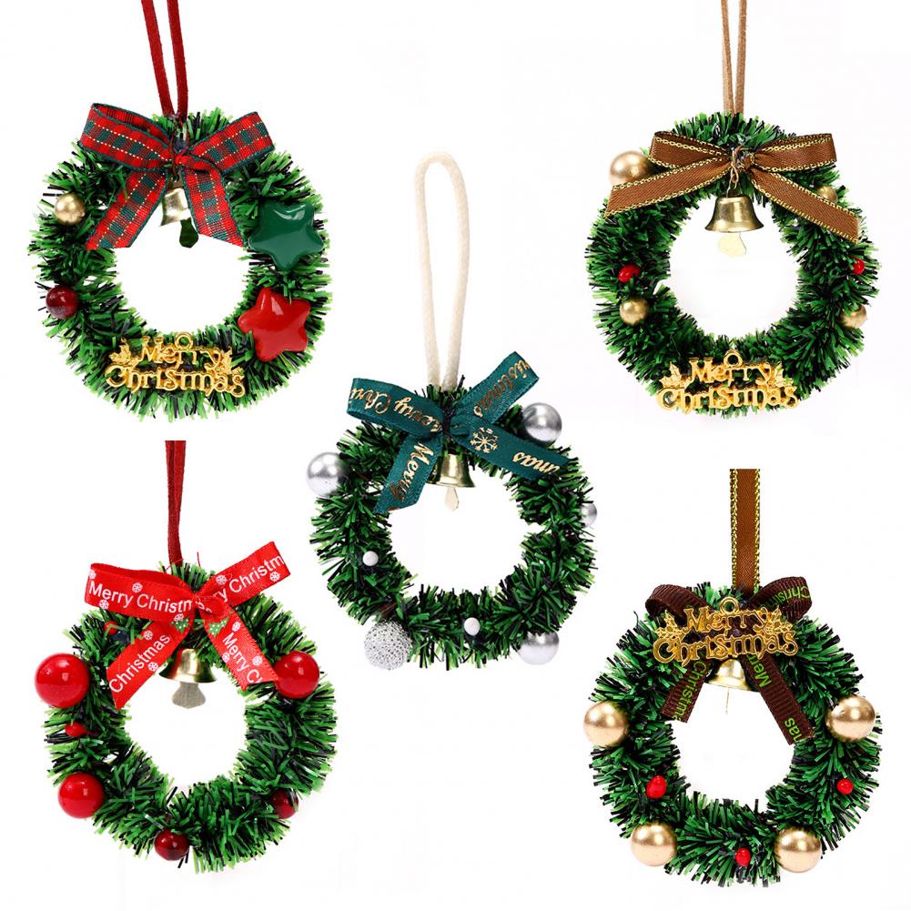 Weihnachtsdekoration Festlicher Mini-Weihnachtskranz mit Schleife Glocke Künstliche Grünpflanzendekoration für Baum Tür Wand Feiertagshaus