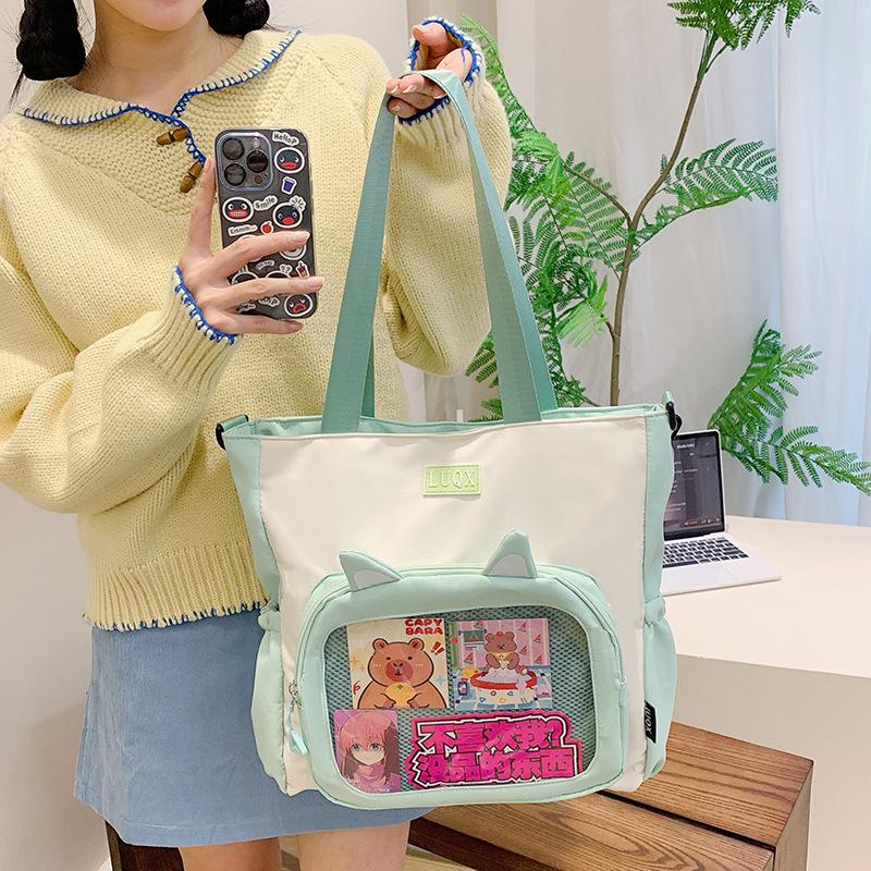 Urocza kosmetyczka w stylu college'owym, torebka 2025 nowa dziewczęca zaawansowana torba na ból, duża pojemność, torba tote na dojazdy