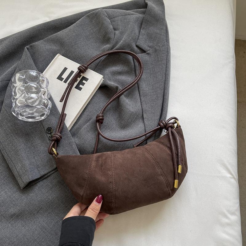 

2025 new Korean niche croissant bag female Sen Meng casual simple messenger dumpling bag daily commuter mobile phone bag темный кофе