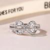 A High-end and Elegant Diamond-encrusted Spiral Ring with Interlaced Lines, a Niche Design for Women's Rings