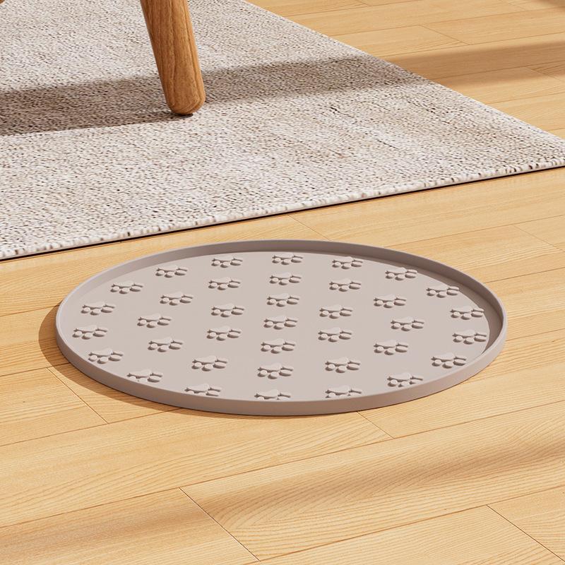1pc Plastics Pet Feeding Mat |, Leakproof, Non-Slip, Oval Dog and Cat Food Mat for Dogs and Cats,Footprint Texture Feeding Pad