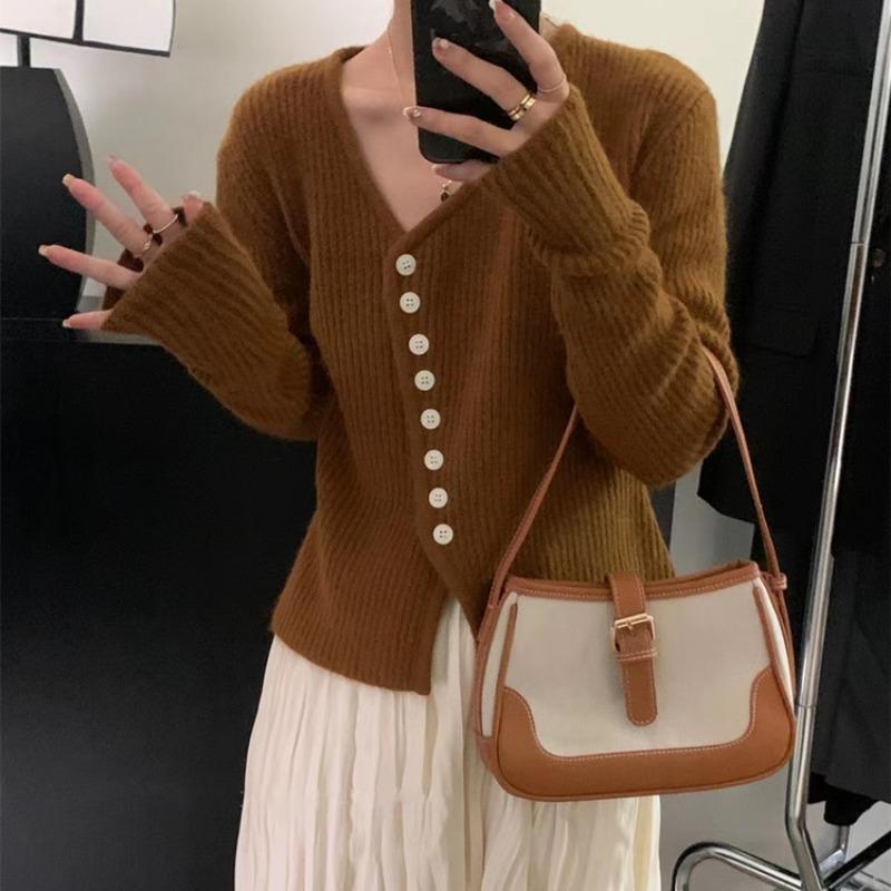 Design sense irregular knitted cardigan top women's autumn and winter new temperament commuting thin inner sweater
