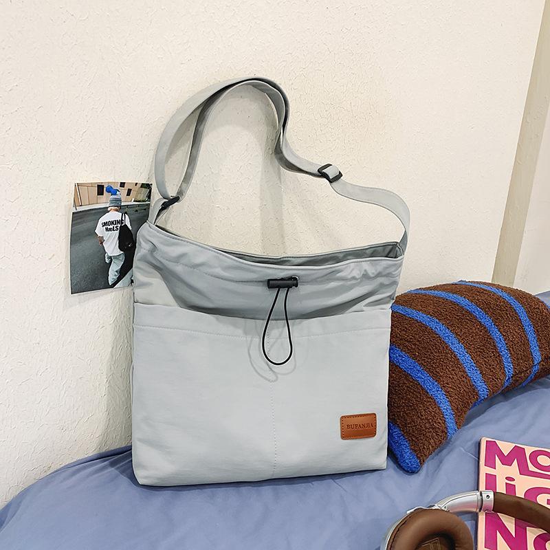 Crossbody bag men's ins trendy Japanese simple large capacity men's backpack couple shoulder bag women's casual student shoulderbag