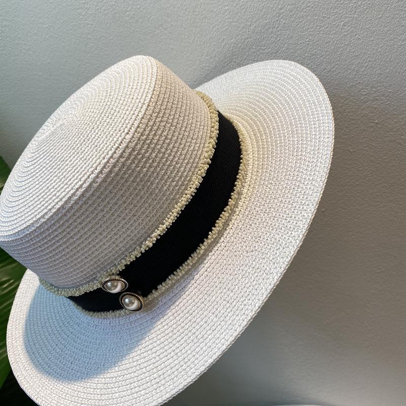 Spring and summer flat top top hat sticker straw woven big eaves hat seaside vacation straw hat sun protection beach hat French sun hat women