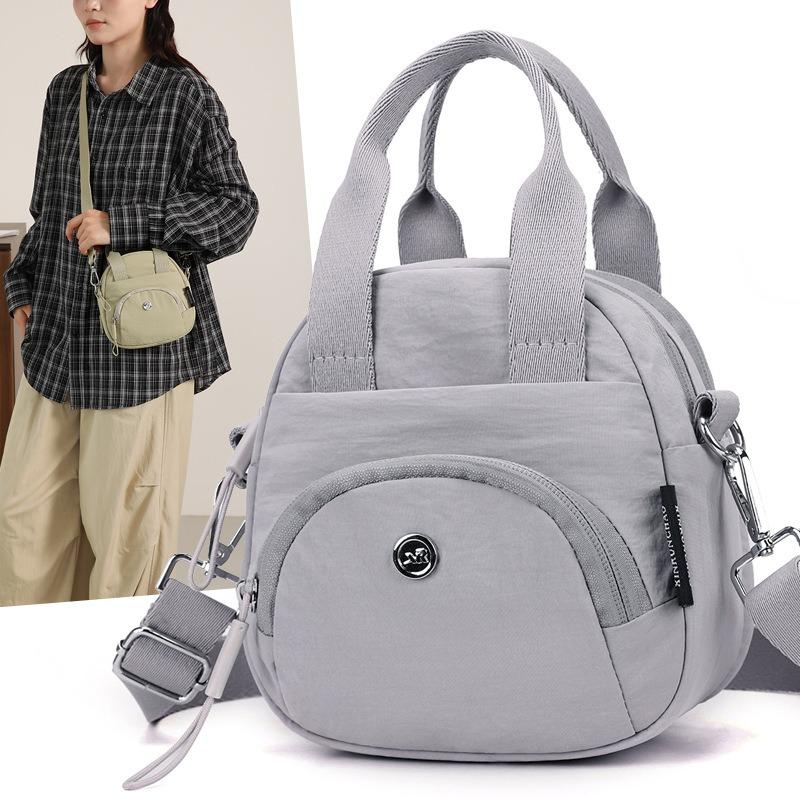 Neue einfache Handtasche lässige Schulter Messenger Bag Mama Einkaufen Handy Wechselgeldtasche große Kapazität Damentasche