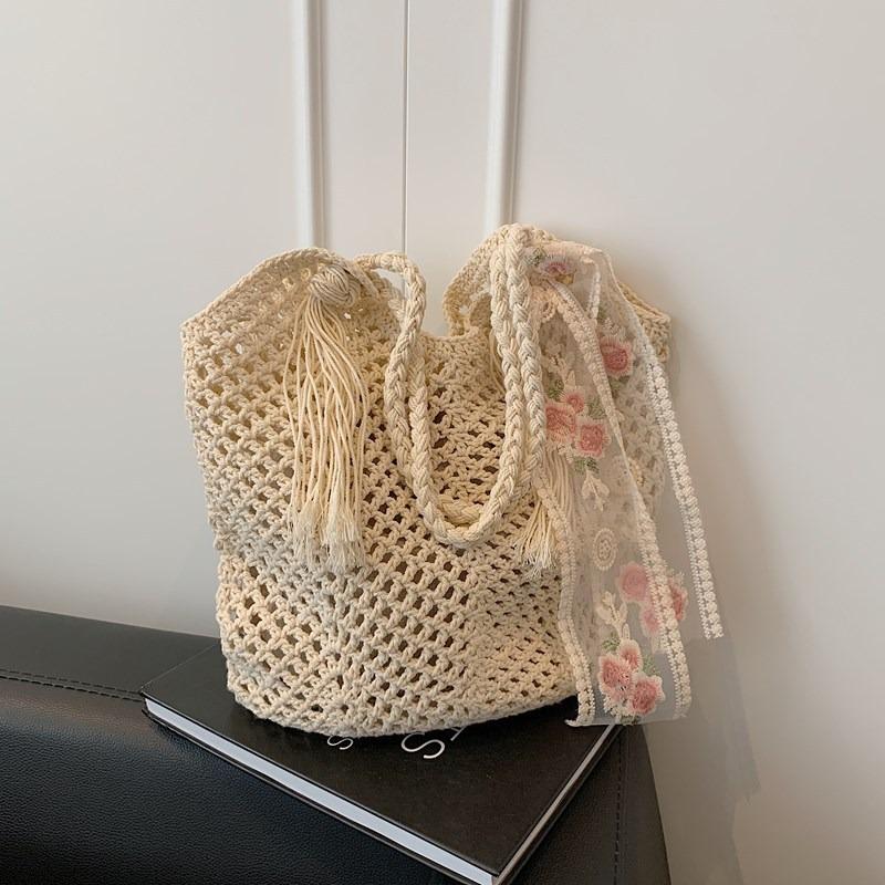 Casual large-capacity woven bag New hollow lazy wind shoulder bag Casual beach bag Women's bag