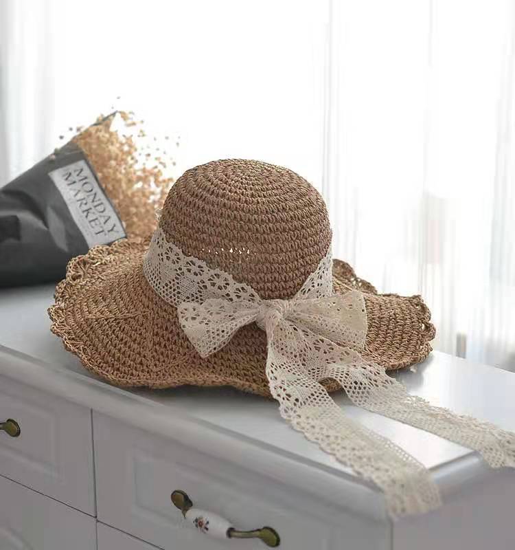 Lace straw hat women's summer bow hollow straw weaving sunscreen sunshade bucket hat sweet beach outing hat