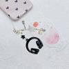 Stylish Music Note Keychain Phone Chain with Headphone Pendant Design for Backpack Phone Accessories and Gift Ideas