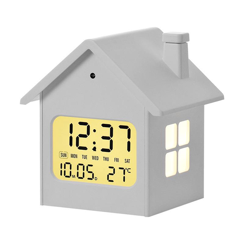 Hausförmiger Multifunktionaler Kinderwecker mit Nachtlicht und LCD-Anzeige.