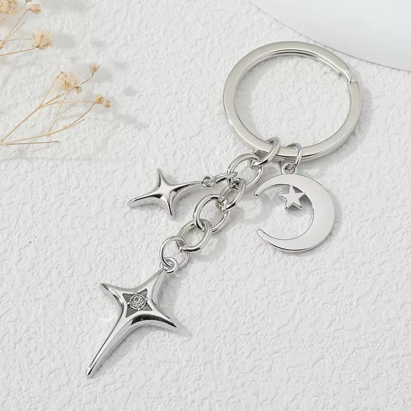 Elegant Star and Moon Hollow Keychain - Unisex Fashion Bag Pendant.