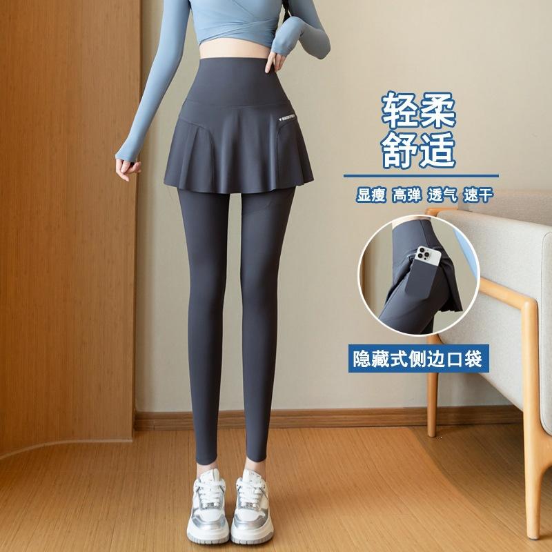 Damen High Waist Rock mit integrierter Leggings Yoga Hosen Verstecken Hüfte Schlankmachende Sporthosen mit versteckter Tasche Schnelltrocknende Neun-Punkt Athletikhosen