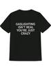 Casual Graphic T-shirt with Bold "GASLIGHTING ISN'T REAL YOU'RE JUST CRAZY" Print - Black with White Lettering