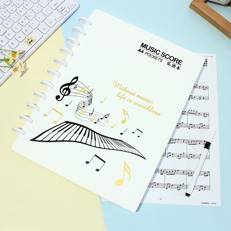 

Папка для нот формата А4 с грибковым зажимом, с многоразовыми, съемными прозрачными вставками для гитары и фортепиано Mushroom Clip Music Score - 10 Pages